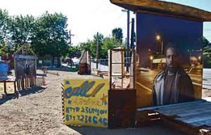 At this installation for “The Corner” in Seattle, residents and passersby contributed to an oral history of the gentrifying neighborhood. Drawn to the corner by flyers and signs, they left audio on an answering machine. (Photo: Inye Wokoma.)