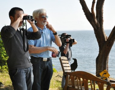 A KCTS crew and retired professor Val Veirs spotting Orcas at Lime Kiln State Park, San Juan Islands, for a "Science on the Spot" episode for Quest. (Photo: Ethan Morris)