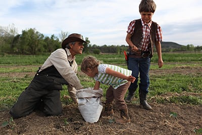 Greg planting (Photo: Julia Kumari Drapkin)