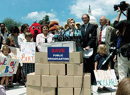Hillary Clinton speaks with Capitol dome in background