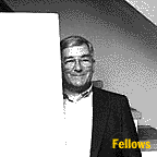 Fellows poses with a stereo speaker he really enjoys