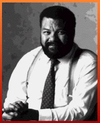 Hampton in beard, suspenders and tie