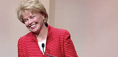 Pat Mitchell, laughing