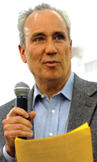 John Boland speaking at NPR New Realities conference in D.C., photo by Current