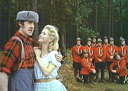Michael Palin leads the Lumberjacks' song.