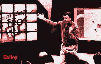 Photo of Bailey speaking to studio audience