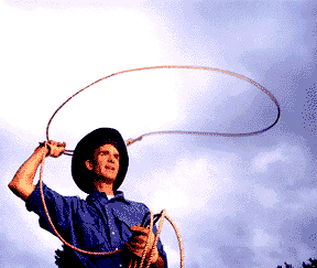 Nye in cowboy hat seemingly demonstrating physics of lariat
